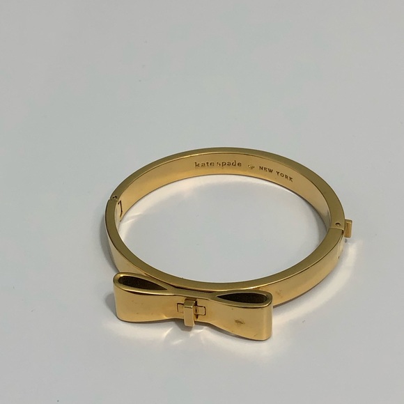 Kate Spade New York Goldtone Bow Bangle Bracelet . - Picture 2 of 9